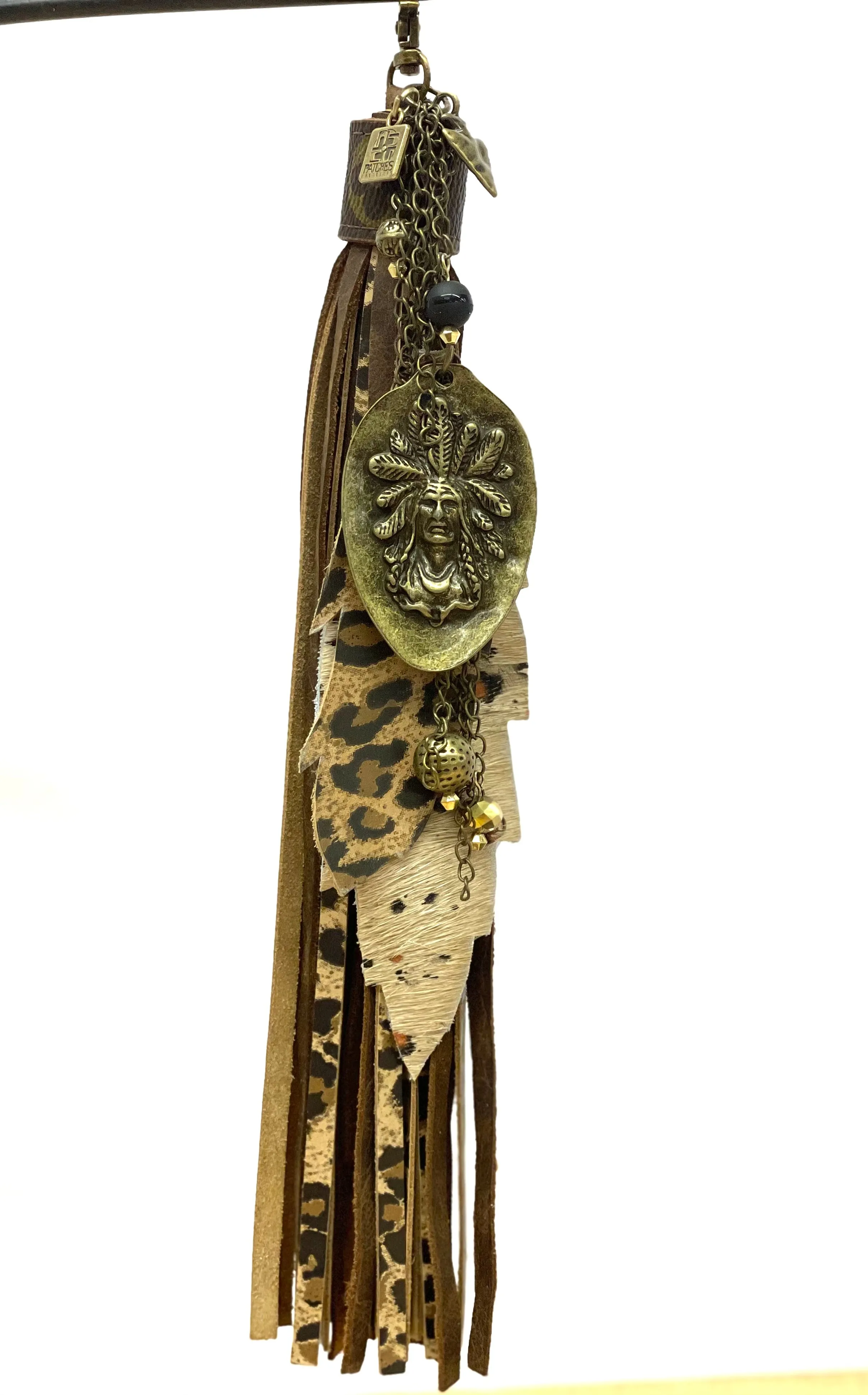 Long purse tassel -leopard and speckled feathers, antique Indian Chief spoon